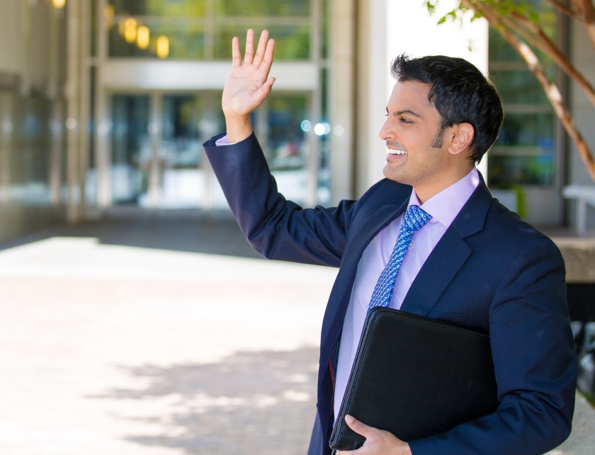 Portrait happy, smiling business man outdoors